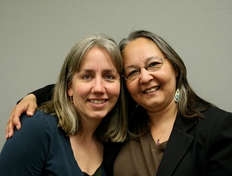 Kristine King, the strongarm, and Sharon Svarny-Livingston, the databaser.