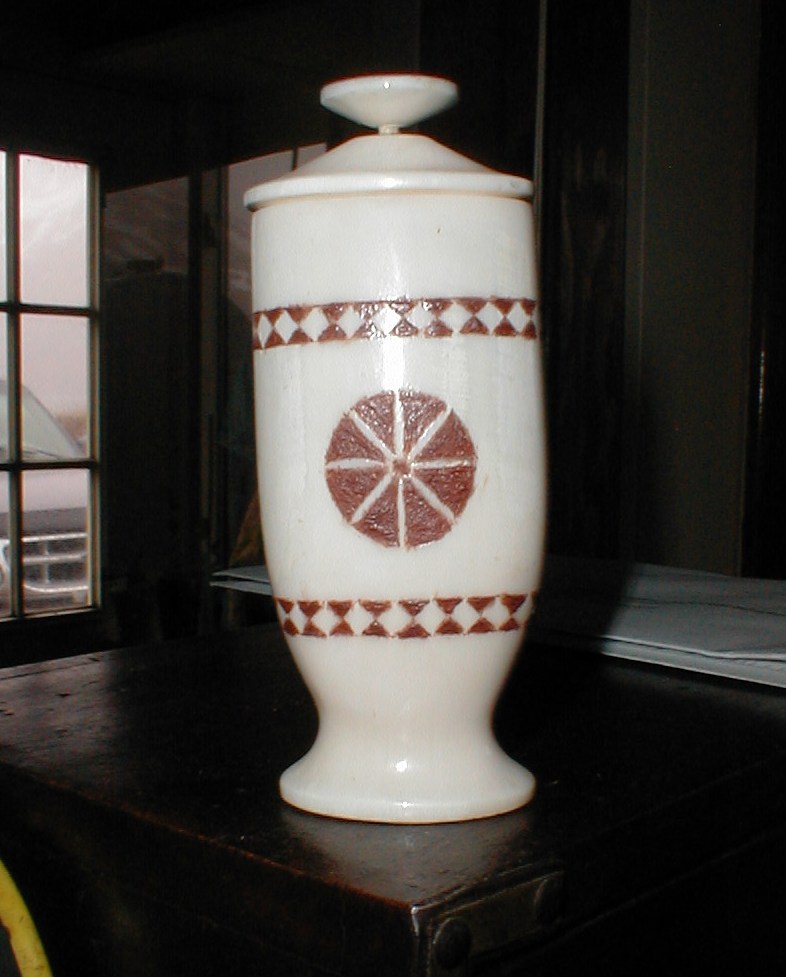 Made from an ivory tusk, Gert ground ochre to make the paint.