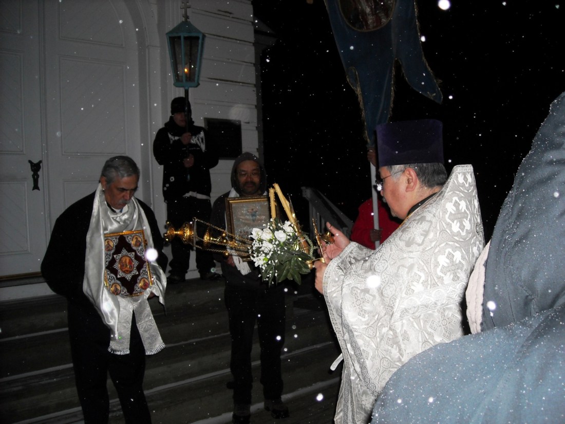 Father Jonah using his sensor outside the church.